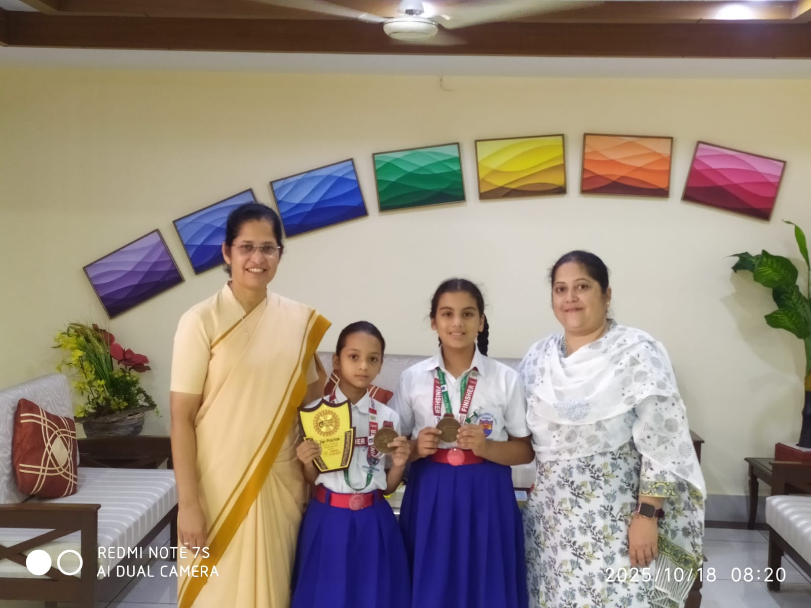 A MEDAL AND A TROPHY AT 10KM MARATHON