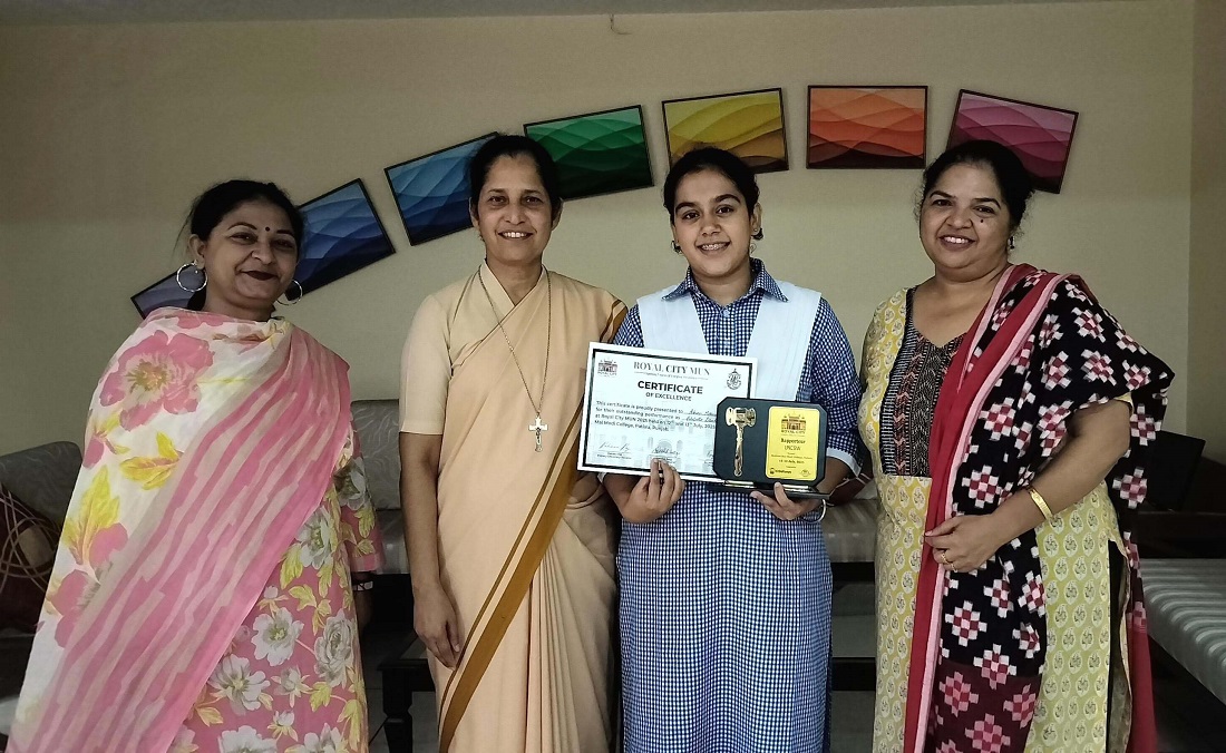 A CERTIFICATE AND A TROPHY AT ROYAL CITY MUN 2025